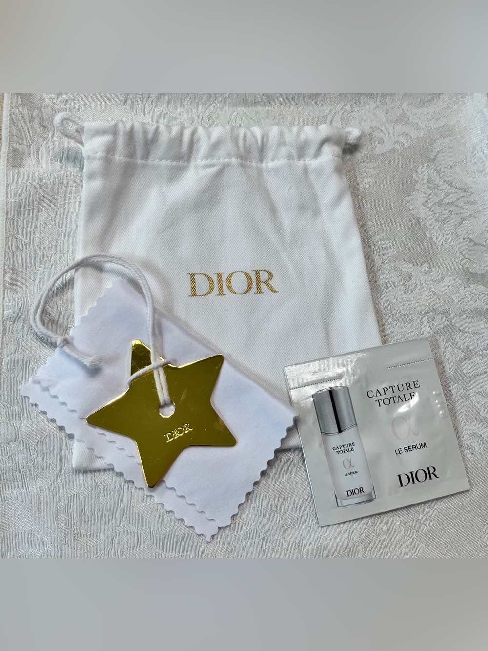 Dior Gold Star Charm, Dior Drawstring Pouch, Cleaning Cloth and Serum Sample - Picture 2 of 5
